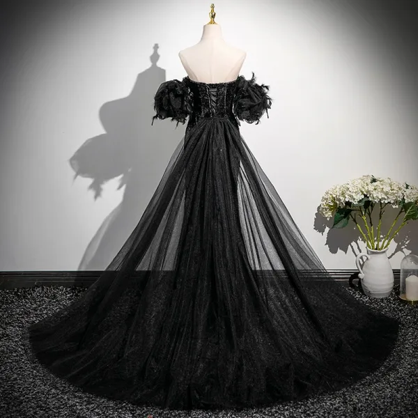 Scintillantes Noire Gland Paillettes Fendue devant Robe De Soirée 2025 Trompette / Sirène De l'épaule Manches Courtes Dos Nu Train De Balayage Robe De Ceremonie