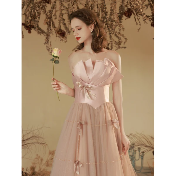 Charmant Rougissant Rose Perlage Robe De Soirée 2023 Princesse Bustier Noeud Sans Manches Dos Nu Longue Soirée Robe De Ceremonie