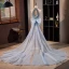 Scintillantes Bleu Ciel Paillettes Robe De Soirée 2023 Trompette / Sirène Titulaire Perlage Sans Manches Dos Nu Noeud Tribunal Train Soirée Robe De Ceremonie