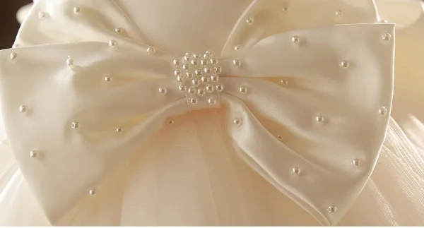 Élégant Champagne Noeud Perle Courte Anniversaire Robe Ceremonie Fille 2024 Robe Boule Encolure Dégagée Sans Manches Tulle