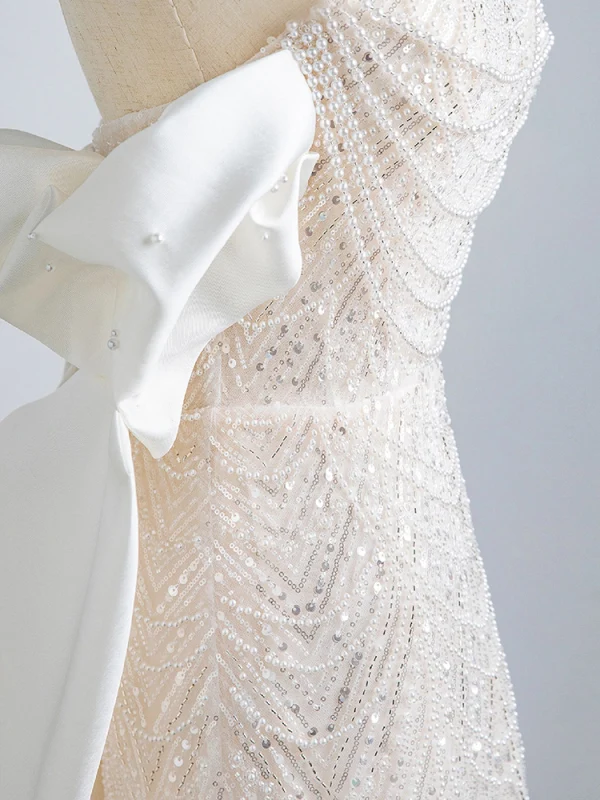 Scintillantes Sexy Ivoire Perle Paillettes Robe De Soirée 2023 Trompette / Sirène Bustier Sans Manches Dos Nu Noeud Train De Balayage Soirée Robe De Ceremonie