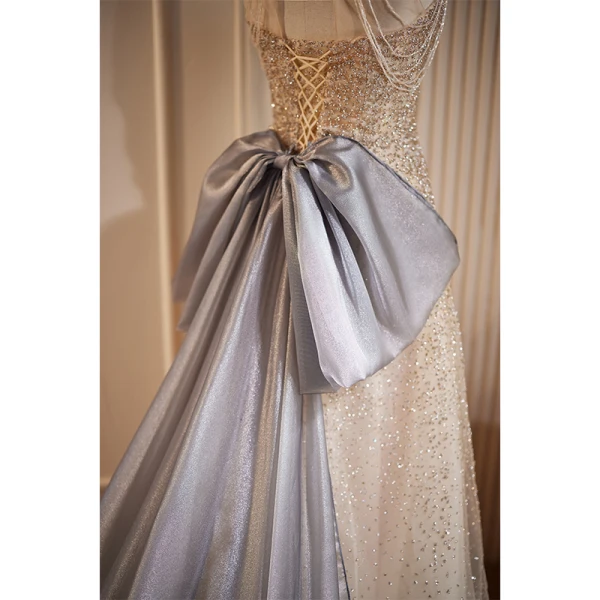Sexy Champagne Perlage Perle Paillettes Robe De Soirée 2023 Princesse Titulaire Sans Manches Dos Nu Noeud Train De Balayage Soirée Robe De Ceremonie