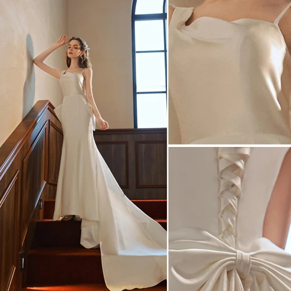 Schlicht Mode Ivory / Creme Satin Brautkleider / Hochzeitskleider 2022 Meerjungfrau Spaghettiträger Ärmellos Rückenfreies Schleife Hof-Schleppe Hochzeit