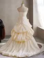 Charmant Champagne Appliques Volants en Cascade Robe De Bal 2026 Princesse Bustier Sans Manches Dos Nu Train De Balayage Promo Robe De Ceremonie