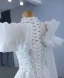 Haut de Gamme Bling Bling Blanche Fait main Perlage Perle Paillettes Robe De Mariée 2024 Trompette / Sirène Col Haut Manches Longues Train De Balayage Mariage