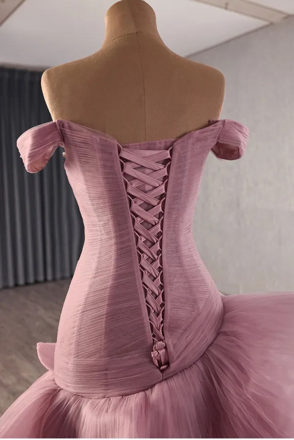 High-end Unusual Blushing Pink Cascading Ruffles Prom Dresses 2025 Ball Gown Off-The-Shoulder Short Sleeve Backless Sweep Train Formal Dresses