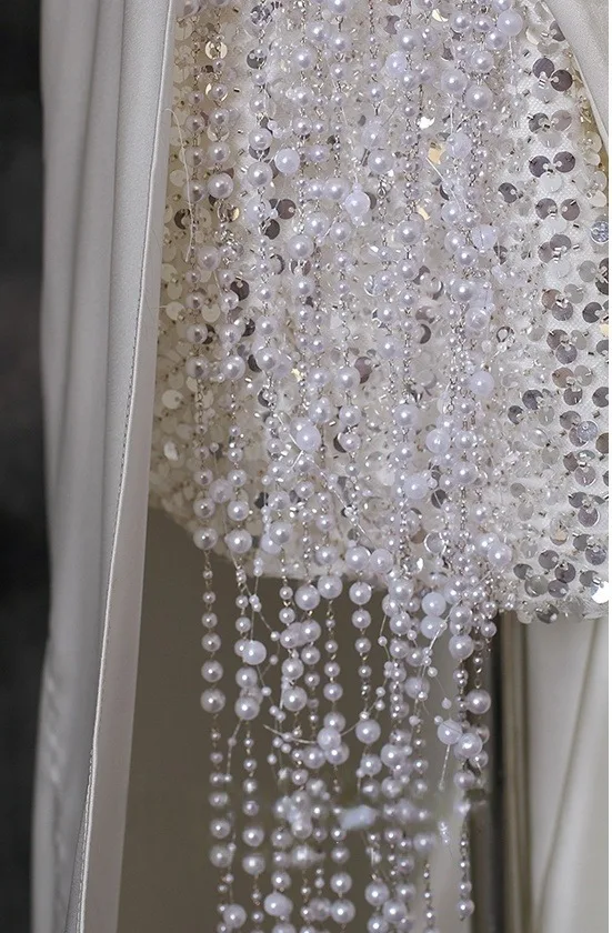 Sexy Weiß Perlenstickerei Perle Pailletten Abendkleider 2025 Meerjungfrau Bandeau Ärmellos Rückenfreies Sweep / Pinsel Zug Festliche Kleider