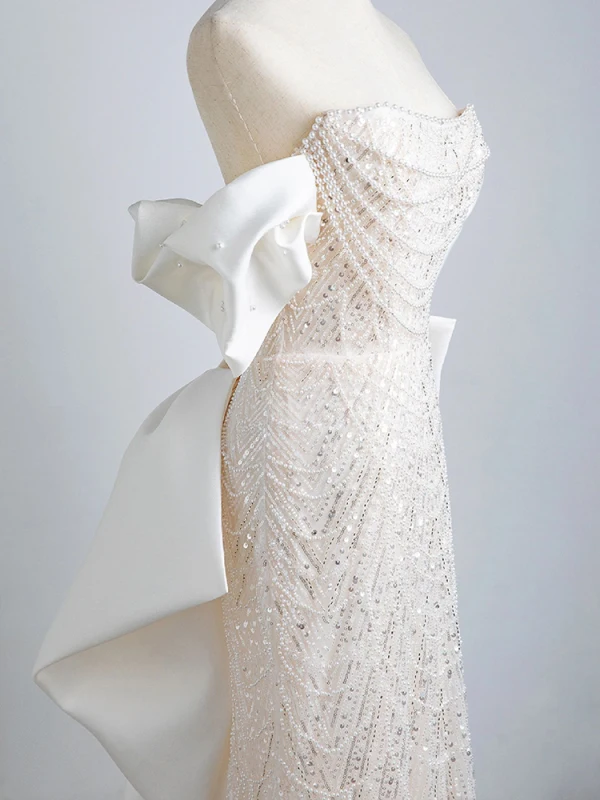 Scintillantes Sexy Ivoire Perle Paillettes Robe De Soirée 2023 Trompette / Sirène Bustier Sans Manches Dos Nu Noeud Train De Balayage Soirée Robe De Ceremonie