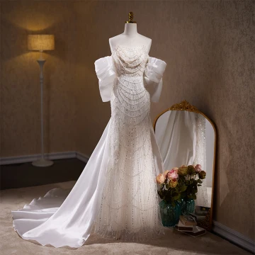 Sexy Glitter Witte Kralen Parel Pailletten Avondjurken 2023 Trompet Zeemeermin Strapless Mouwloos Ruglooze Strik Sweep Trein Avond