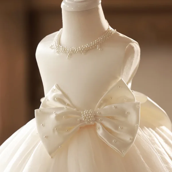 Élégant Champagne Noeud Perle Courte Anniversaire Robe Ceremonie Fille 2024 Robe Boule Encolure Dégagée Sans Manches Tulle