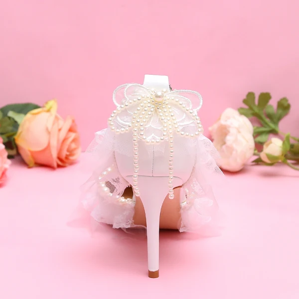 Elegante Weiß Perle Schleife Spitze Brautschuhe 2024 Knöchelriemen 9 cm Stilettos Spitzschuh Hochzeit Sandaletten Hochhackige
