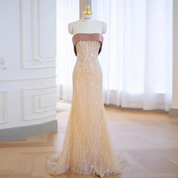 Charmant Champagne Perlage Paillettes Robe De Soirée 2022 Trompette / Sirène Bustier Sans Manches Dos Nu Noeud Tribunal Train Soirée Robe De Ceremonie