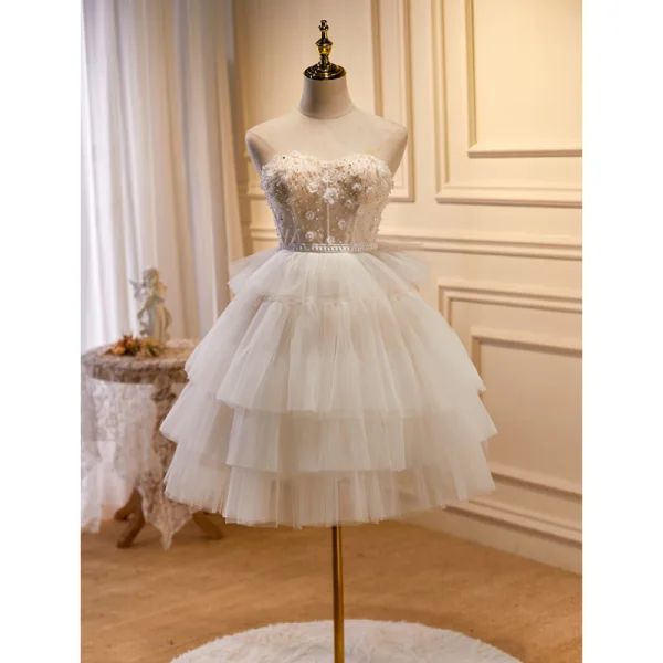 Sexy Ivoire Perlage Perle Paillettes Appliques Robe De Fête 2023 Princesse Bustier Sans Manches Dos Nu Soirée Courte Robe De Fete