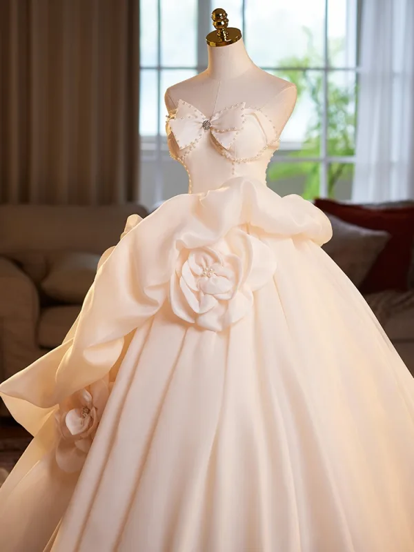 Elegant Champagne Pearl Appliques Satin Prom Dresses 2025 Ball Gown Strapless Bow Sleeveless Backless Sweep Train Formal Dresses