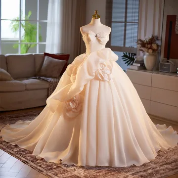 Elegant Champagne Pearl Appliques Satin Prom Dresses 2025 Ball Gown Strapless Bow Sleeveless Backless Sweep Train Formal Dresses