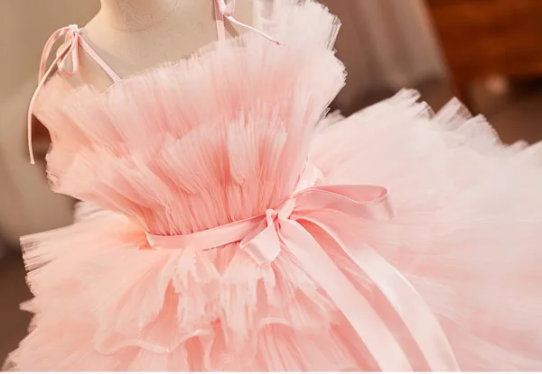 Fashion Blushing Pink Cascading Ruffles Birthday Flower Girl Dresses 2025 Ball Gown Spaghetti Straps Sleeveless Backless Bow Sash Court Train