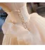 Elegant Champagne Pearl Appliques Satin Prom Dresses 2025 Ball Gown Strapless Bow Sleeveless Backless Sweep Train Formal Dresses