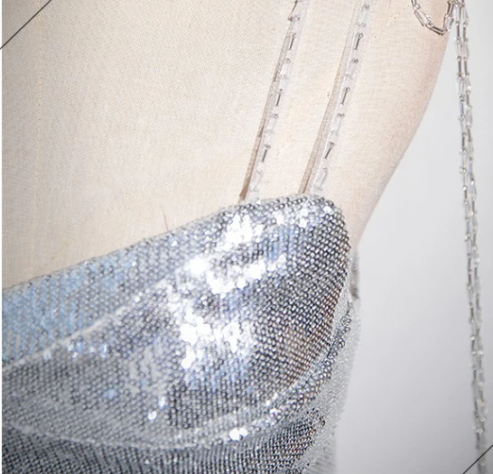 Sexy Scintillantes Argenté Paillettes Robe De Soirée 2024 Trompette / Sirène Bretelles Spaghetti Sans Manches Dos Nu Train De Balayage Soirée Robe De Ceremonie