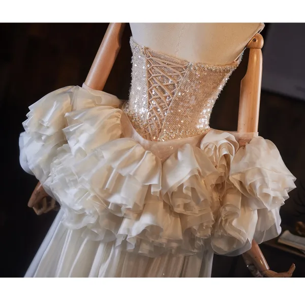 Luxe Scintillantes Champagne Paillettes Robe De Soirée 2026 Trompette / Sirène Bustier Gonflée Manches Courtes Dos Nu Train De Balayage Robe De Ceremonie