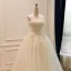 Haut de Gamme Élégant Champagne Fait main Perlage Appliques Robe De Mariée 2026 Princesse Bustier Sans Manches Dos Nu Longue