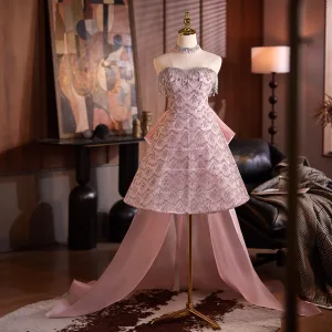 Sjarmerende Bling Bling Rødmende Rosa Beading Rhinestone Paljetter Selskapskjoler 2025 Prinsesse Kjæreste Uten Ermer Ryggløse Sløyfe Knelengde Aften