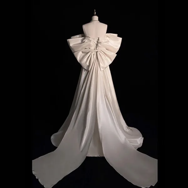 Élégant Ivoire Satin Robe De Bal 2025 Princesse De l'épaule Gonflée Manches Courtes Dos Nu Noeud Train De Balayage Promo Robe De Ceremonie