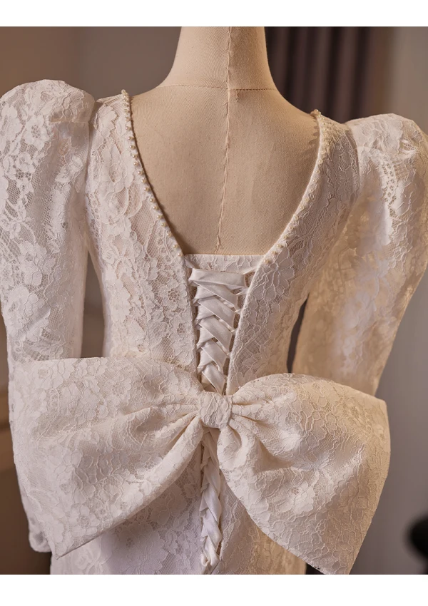 Vintage / Retro Ivory Lace Flower Wedding Dresses 2024 Trumpet / Mermaid V-Neck 3/4 Sleeve Backless Bow Sweep Train