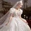 Lyx Elfenben Cascading Volanger Bröllopsklänningar 2022 Balklänning Urringning Pösigt Korta ärm Beading Pärla Rhinestone Paljetter Halterneck Rosett Royal Train Bröllop