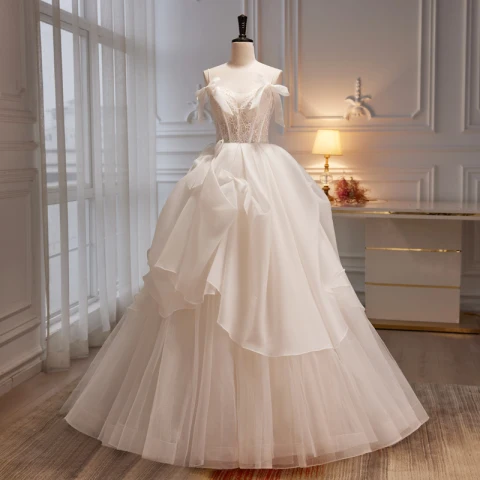 Charming White Organza Cascading Ruffles Prom Dresses 2023 Ball Gown Spaghetti Straps Bow Sleeveless Backless Floor-Length / Long Prom Formal Dresses