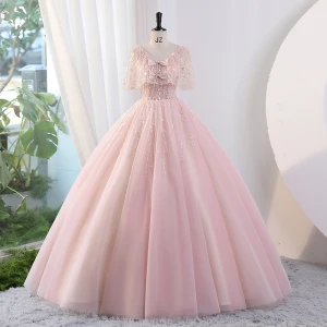 Encantador Rosa Clara Rebordear Bowknot Lentejuelas Vestidos De Gala 2023 Ball Gown V Cuello Manga Corta Sin Espalda Largos Gala Vestidos Formales