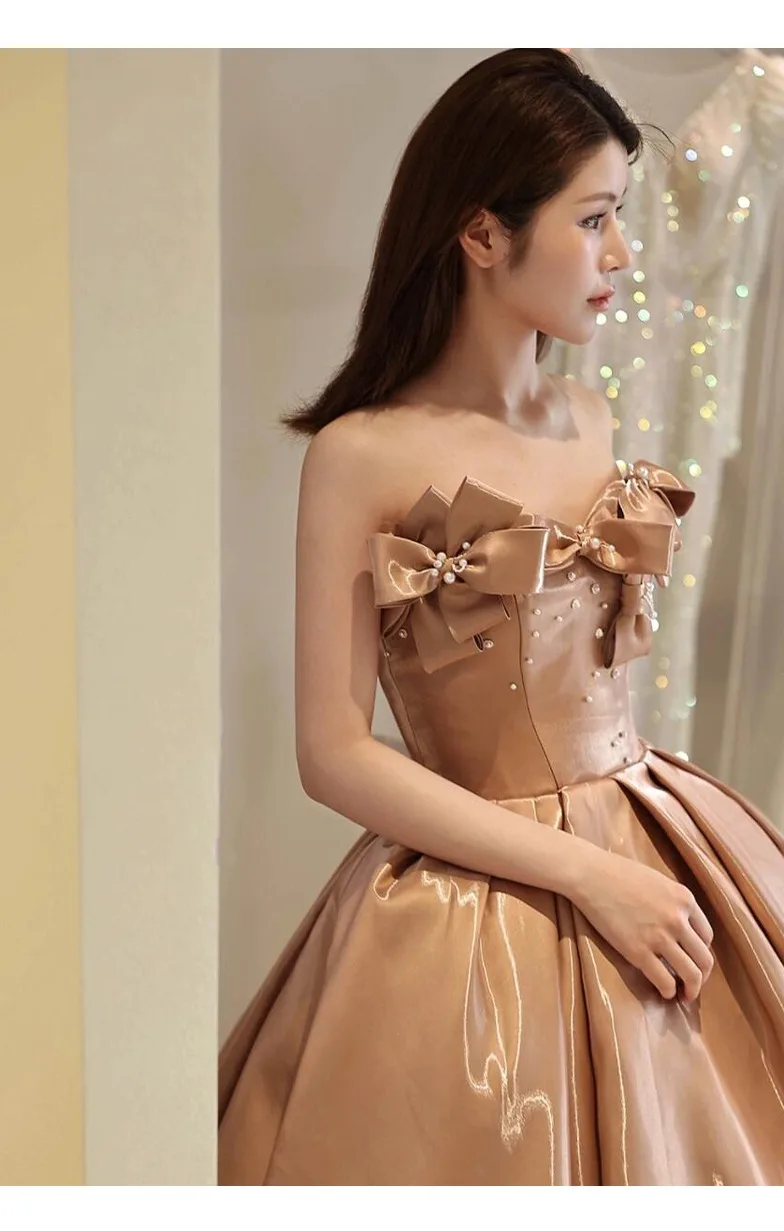 Elegant Blushing Pink Satin Prom Dresses 2025 Ball Gown Strapless Bow Sleeveless Long Elegant Blushing Pink Satin Prom Dresses 2025 Ball Gown Strapless Bow Sleeveless Long