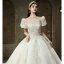 High End Vintage Ivory / Creme Perlenstickerei Perle Strass Brautkleider / Hochzeitskleider 2022 Ballkleid Rundhalsausschnitt Kurze Ärmel Rückenfreies Königliche Schleppe Hochzeit