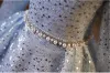 Scintillantes Bleu Ciel Perlage Perle Faux Diamant Anniversaire Robe Ceremonie Fille 2024 Robe Boule Encolure Dégagée 3/4 Manches Dos Nu Longue