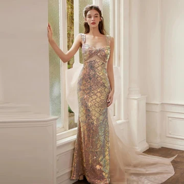 Sexy Champagne Sequins Evening Dresses 2022 Trumpet Mermaid Satin Spaghetti Straps Sleeveless Backless Bow Court Train Evening Party Formal Dresses