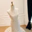 Luxury / Gorgeous Fashion Champagne Handmade  Pearl Sequins Lace Flower Wedding Dresses 2026 Trumpet / Mermaid Halter Sleeveless Sweep Train