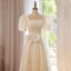Élégant Champagne En Dentelle Fleur Robe De Bal 2022 Princesse Perle Encolure Carrée Gonflée Manches Courtes Dos Nu Noeud Longue Robe De Ceremonie