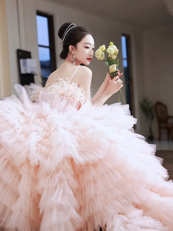 Charmant Rosa Fallende Rüsche Brautkleider / Hochzeitskleider 2023 Ballkleid Spaghettiträger Quaste Ärmellos Rückenfreies Schleife Stoffgürtel Kapelle-Schleppe Hochzeit