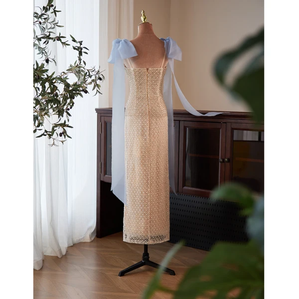Haut de Gamme Charmant Champagne Faux Diamant Paillettes Robe De Soirée 2023 Bretelles Spaghetti Noeud Sans Manches Dos Nu Longue Soirée Robe De Ceremonie