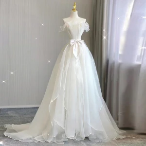 Mode Blanche Noeud Robe De Mariée 2023 Princesse Bustier Sans Manches Dos Nu Train De Balayage Mariage