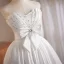 Charmant Blanche Faux Diamant Noeud de retour Robe De Graduation 2025 Robe Boule Bustier Sans Manches Dos Nu Longue Robe De Ceremonie