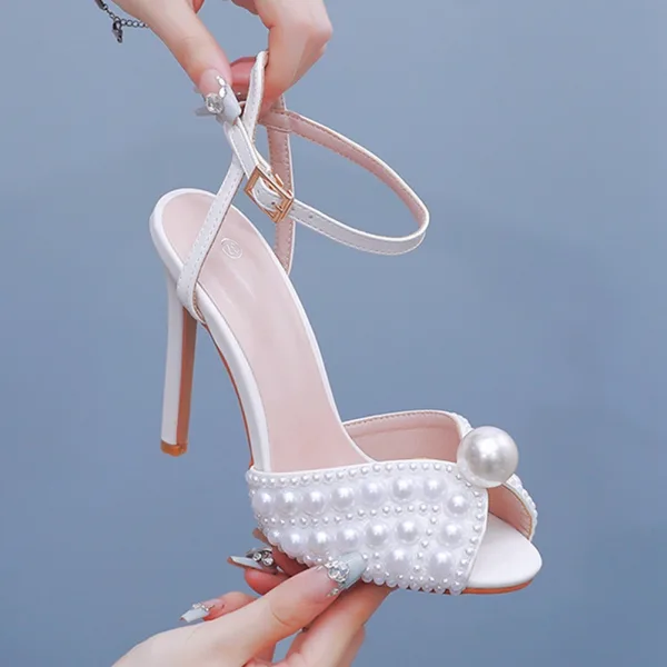 Elegant White Pearl Wedding Shoes 2024 Ankle Strap 11 cm Stiletto Heels Open / Peep Toe Wedding Sandals High Heels