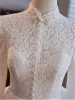Vintage / Retro Ivory Pearl Lace Flower Wedding Dresses 2024 A-Line / Princess High Neck Long Sleeve Backless Bow Floor-Length / Long