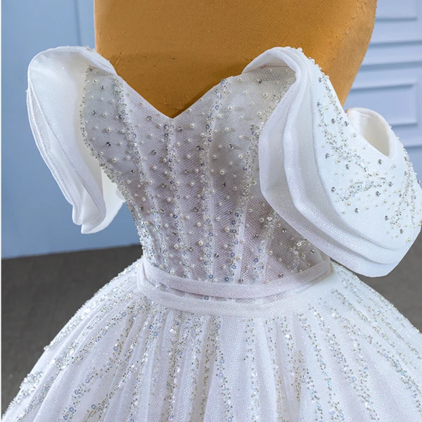 Best Charming White Beading Pearl Sequins Wedding Dresses 2022 Ball Gown Strapless Sleeveless Backless Sash Chapel Train Wedding
