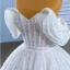 Best Charming White Beading Pearl Sequins Wedding Dresses 2022 Ball Gown Strapless Sleeveless Backless Sash Chapel Train Wedding