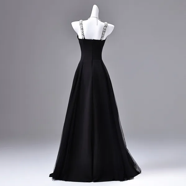 Audrey Hepburn-Stil Schwarz Strass Ballkleider 2026 A Linie Spaghettiträger Ärmellos Rückenfreies Lange Festliche Kleider