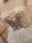 Sexy Ivoire Perlage Perle Paillettes Appliques Robe De Fête 2023 Princesse Bustier Sans Manches Dos Nu Soirée Courte Robe De Fete