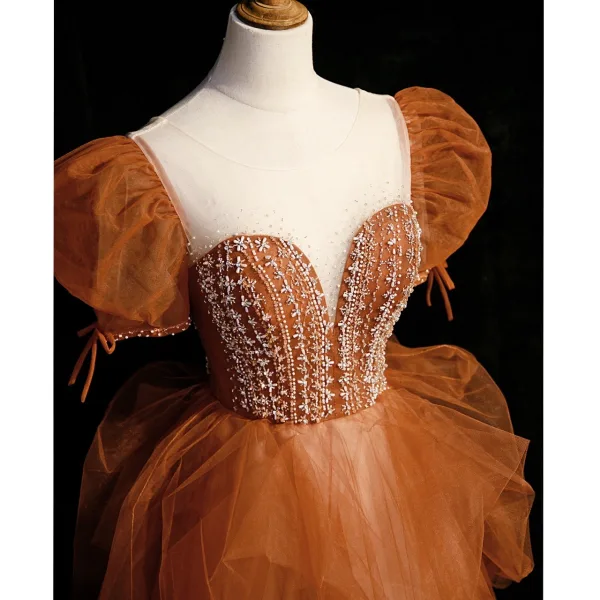 Élégant Tan Perlage Perle Robe De Bal 2022 Princesse Encolure Dégagée Gonflée Manches Courtes Dos Nu Longue Robe De Ceremonie