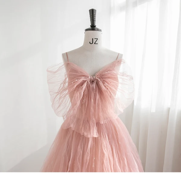 Charmant Rougissant Rose Perlage Robe De Soirée 2023 Princesse Bretelles Spaghetti Noeud Sans Manches Dos Nu Longue Soirée Robe De Ceremonie