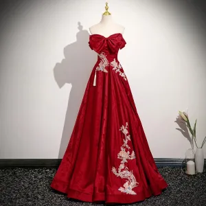 Élégant Rouge Perlage Brodé Robe De Bal 2025 Princesse Bustier Noeud Sans Manches Dos Nu Longue Robe De Ceremonie