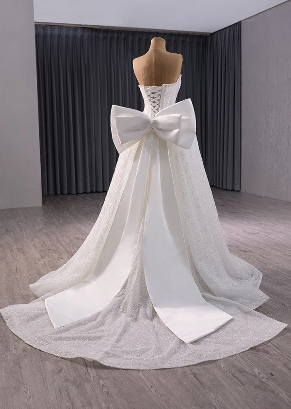 Luxe Blanche Fait main Perlage Perle Paillettes Robe De Mariée 2024 Trompette / Sirène Bustier Sans Manches Dos Nu Noeud Train De Balayage Mariage